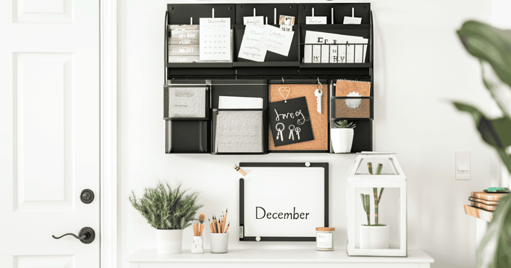 Mail stored in a wall organizer at the entryway