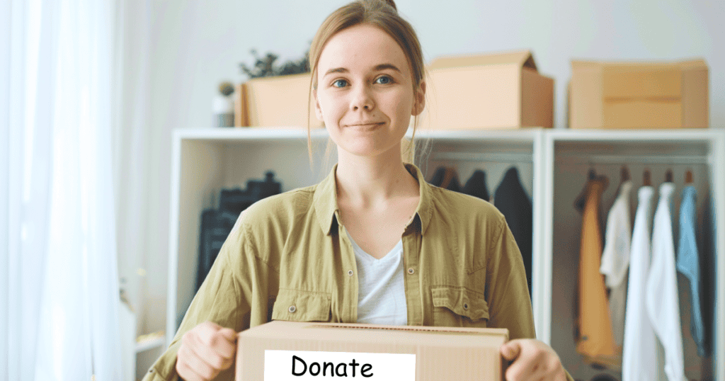 girl holding a donation box