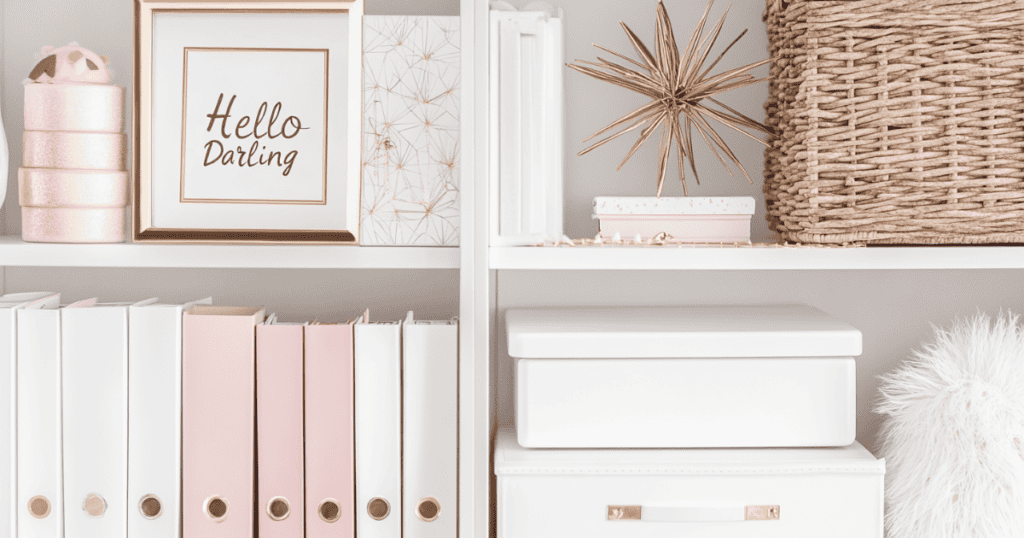 Shelves with pink and white storage boxes