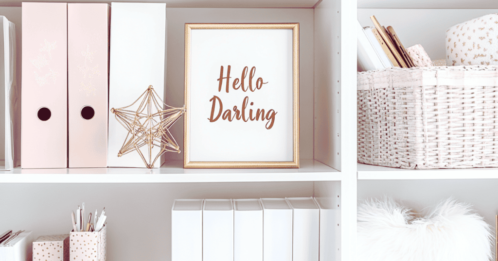 Picture that says Hello Darling on a bookshelf in an office