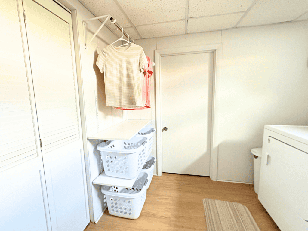 Hanging bar and adjustable shelves with clothes baskets in my small laundry room