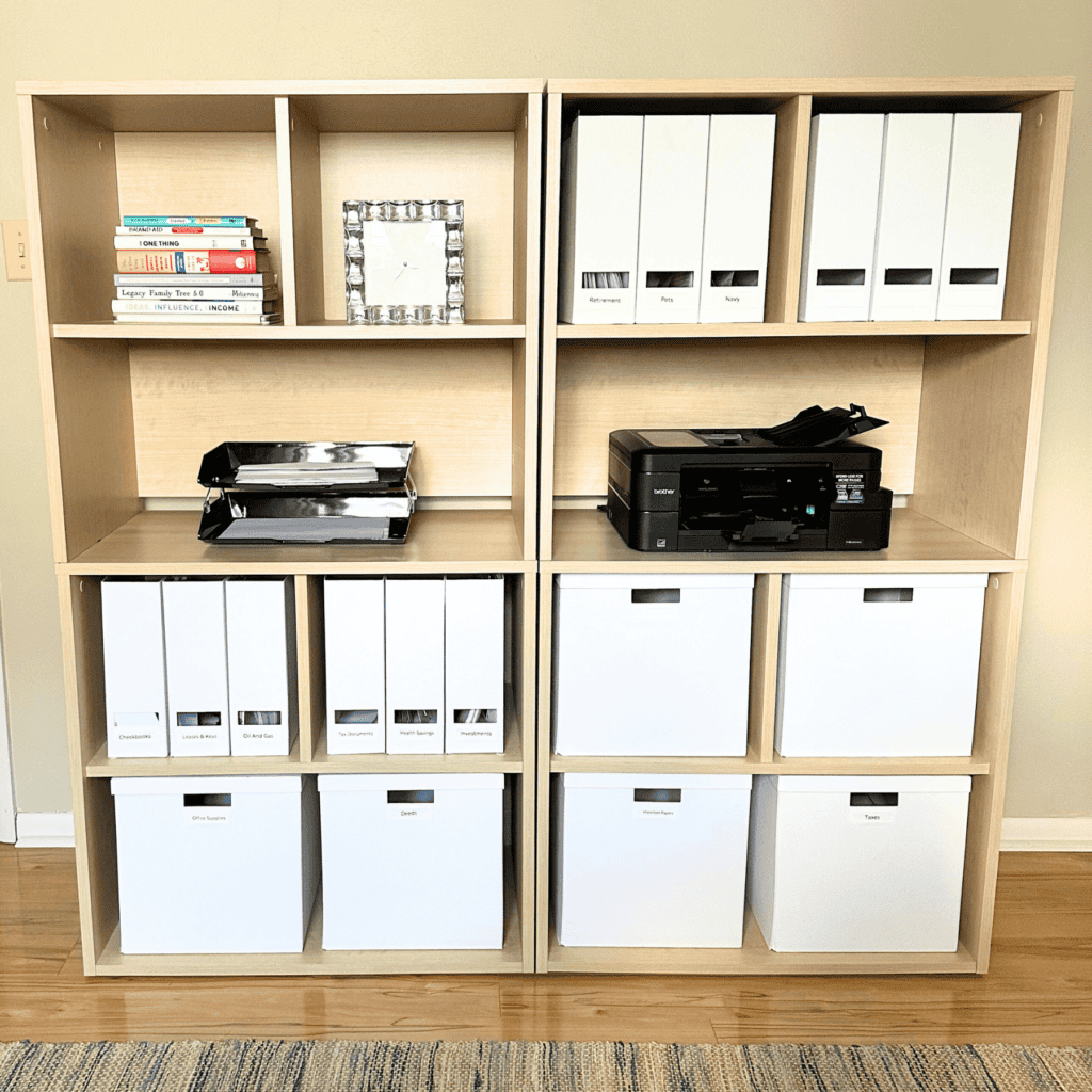 Cubed bookcase in my home office with white storage boxes on shelves