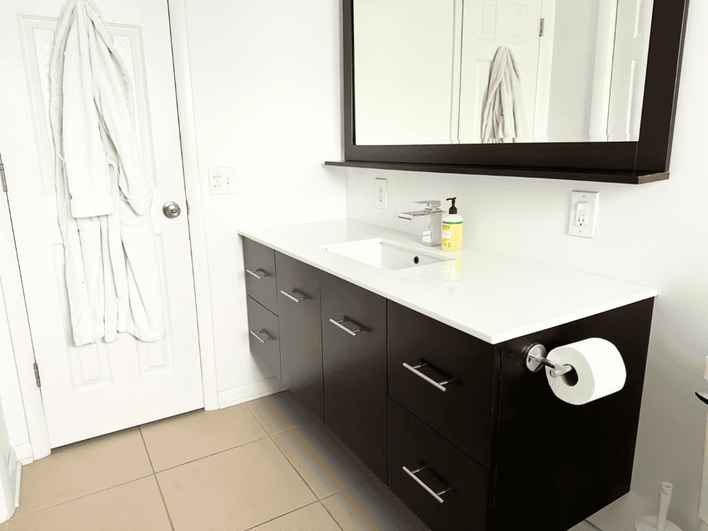 Large sink vanity in a small bathroom with a single sink