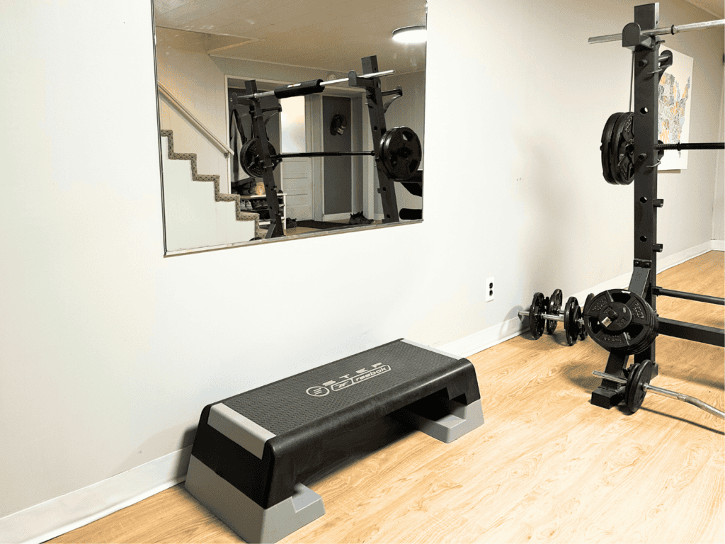 A mirror above the stepper in my home gym